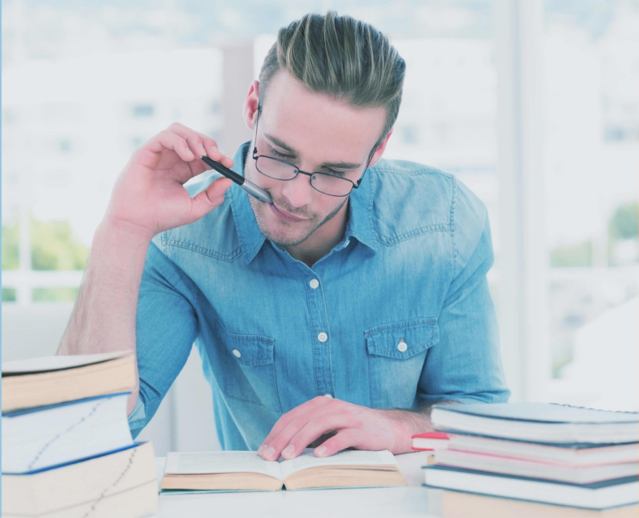 Student reviewing investment portfolio strategies and financial planning materials during practical learning session
