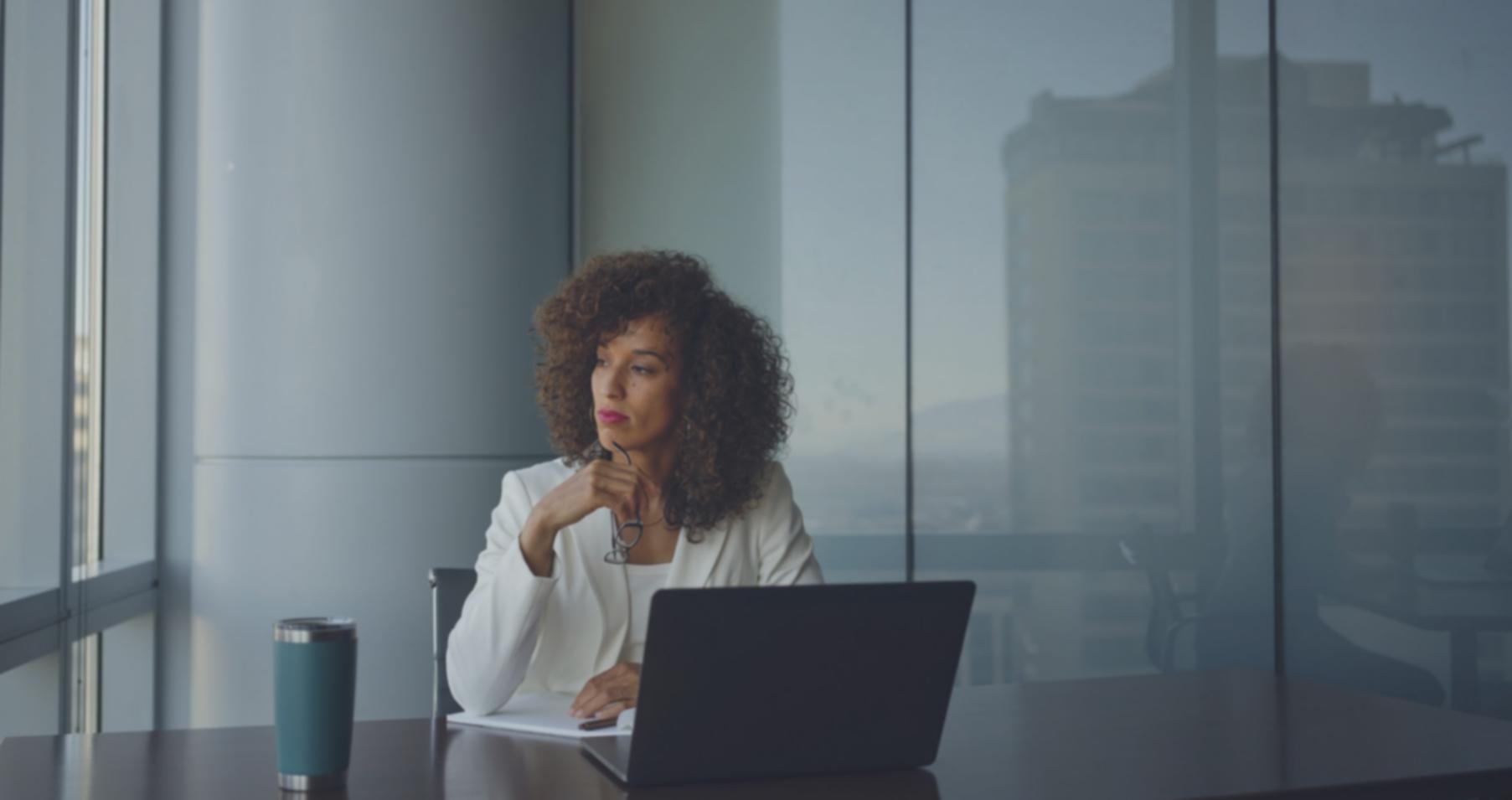 Student reviewing investment portfolio materials and market analysis documents