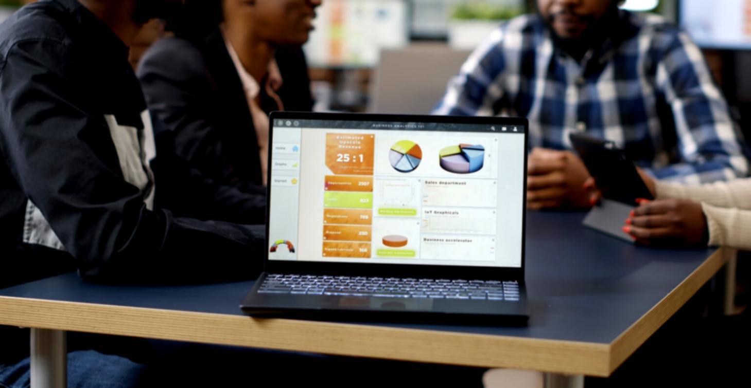 Professional investment analysis workspace showing market data and research materials